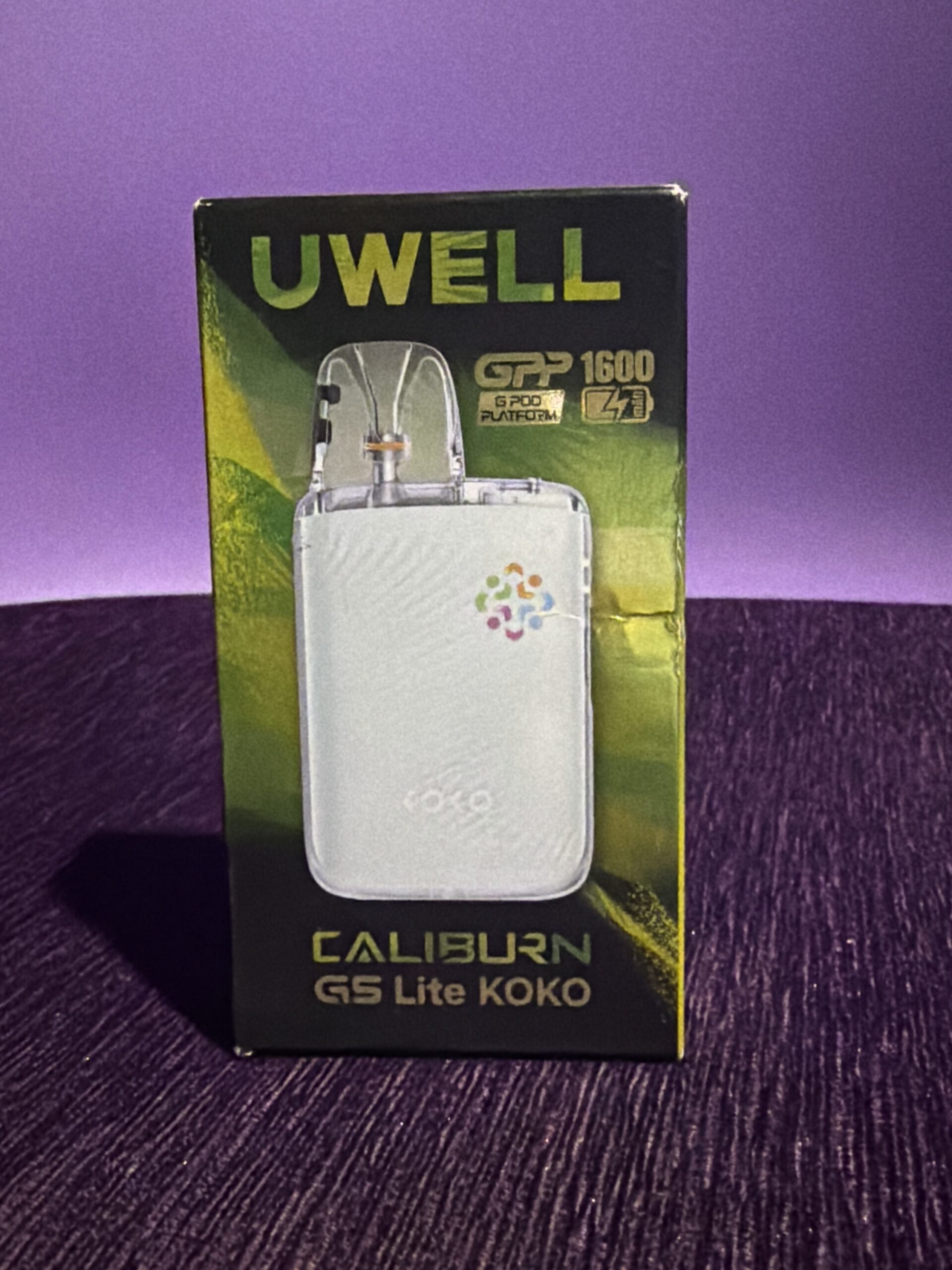 b6384f17-a4bc-4ccf-ba3a-892d001165cd-10559-000003e31c2ff8f3_file uwell caliburn g5 koko peacock green (copy)